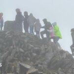 'Selfish' mountaintop selfies face criticism from queuing crowds