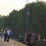 Bus crash sees 12 killed and several injured as vehicle overturns 'trapping passengers'