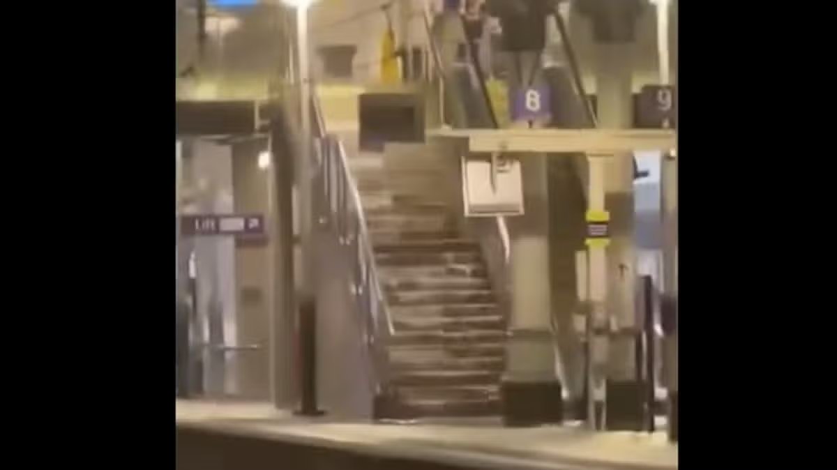 WATCH: Moment rain gushes down stairs at Manchester Piccadilly station amid huge storm