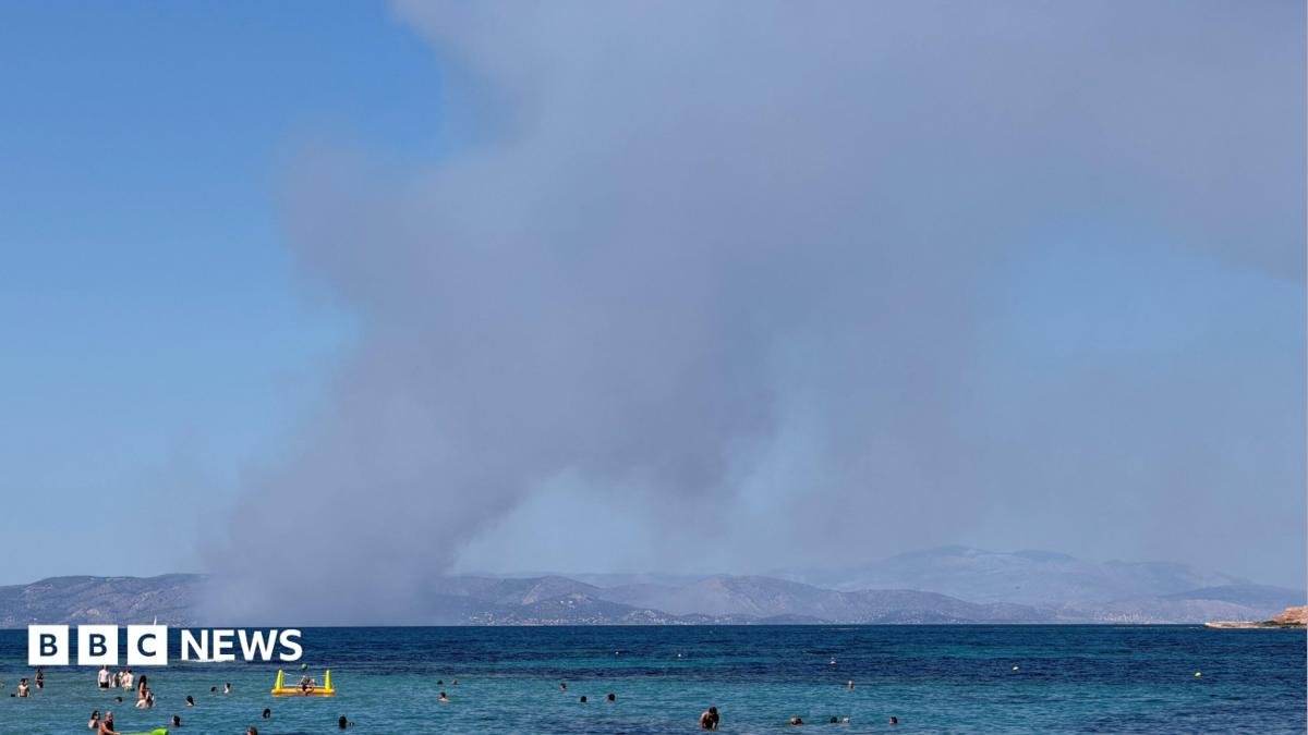 Two dead and hundreds evacuated as wildfires break out near Athens