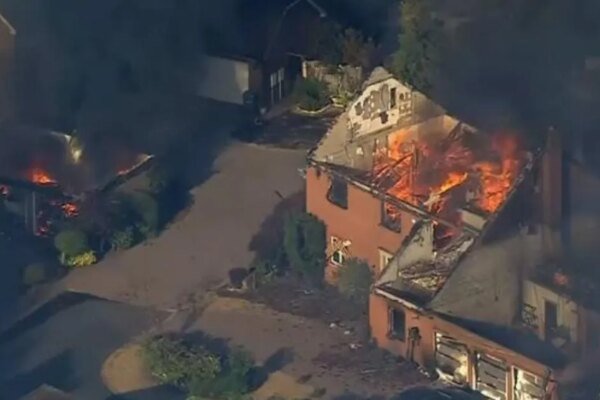 Grass fire sets homes alight in West Midlands blaze as residents flee | News UK