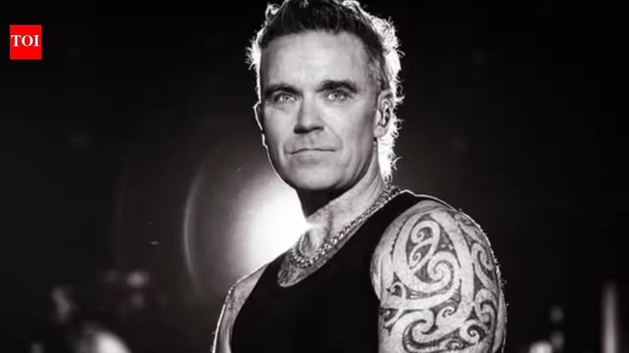 Robbie Williams says he has a ‘little bit of autism’ anad uses creativity to cope: 'It’s best to train my brain to do something better...'