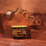 DOJ, CFTC Investigating Iron Ore Trader Radiant World’s Deals