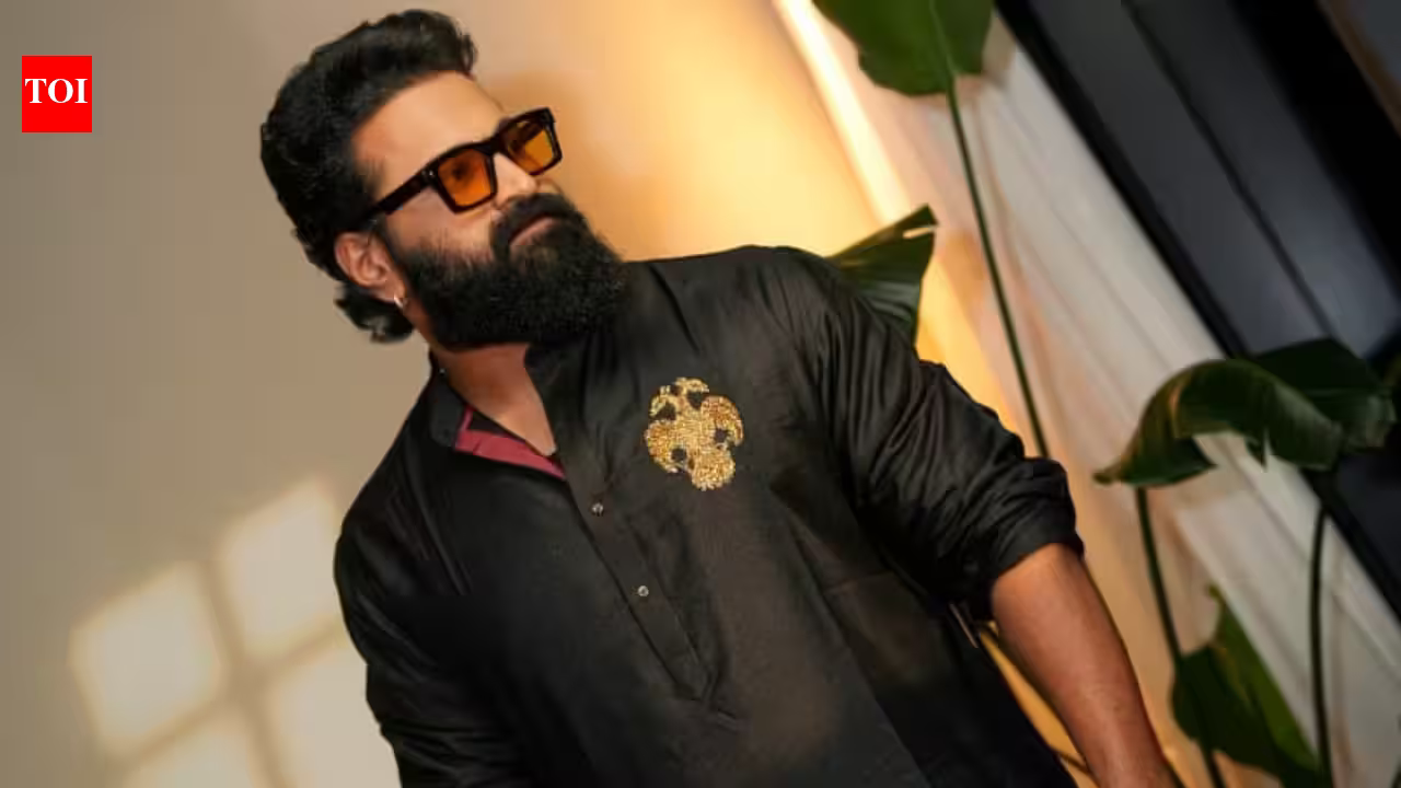 Rishab Shetty makes a cultural statement at IFFM 2026 Red Carpet in traditional black kurta and handwoven silk dhoti |