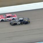 Bump-and-run sparks Berry-Wallace battle for lead