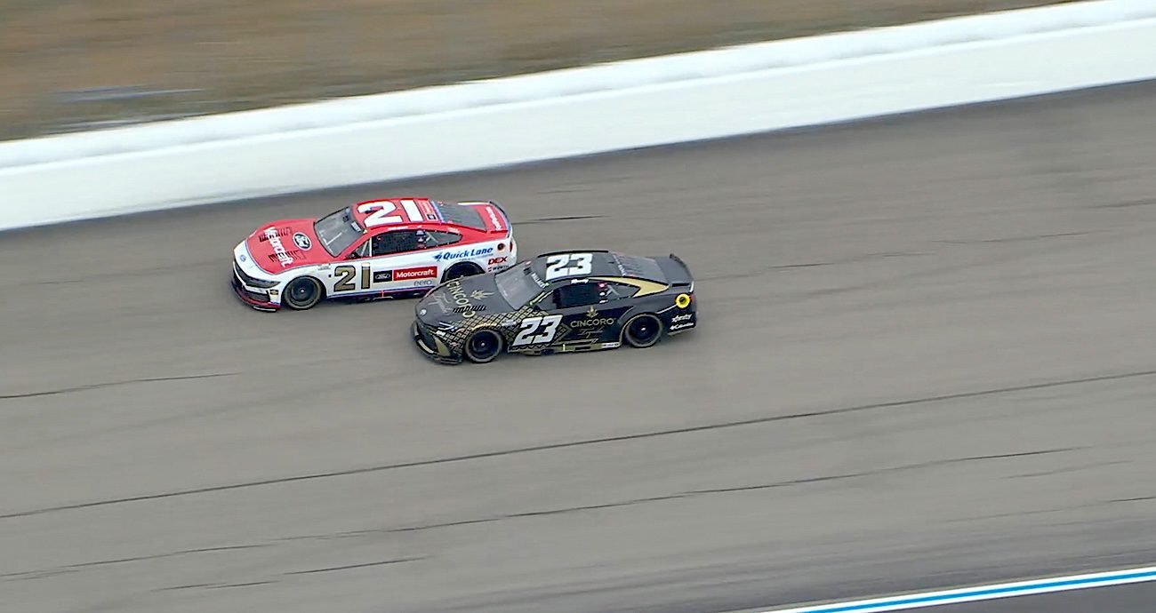 Bump-and-run sparks Berry-Wallace battle for lead