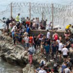 The AP reveals how false online rumors drove a migrant surge from Morocco to Spain, breaking news on a highly competitive story