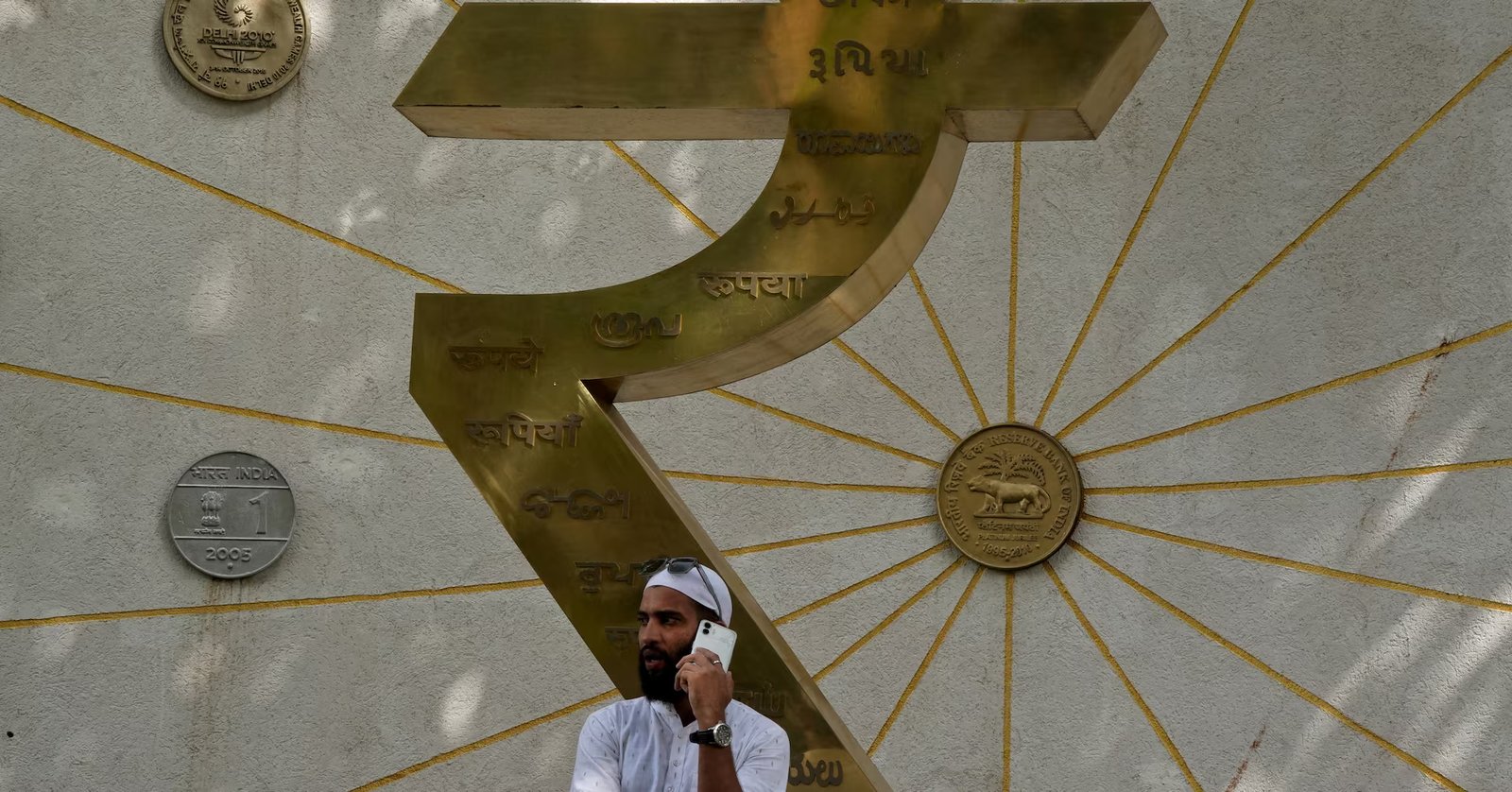 Indian central bank keeps up interventions to cushion rupee from oil strain, traders say