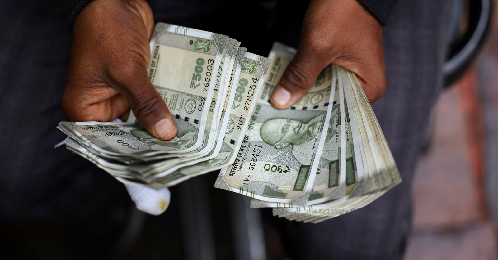 Indian central bank likely intervenes to shield rupee from oil strain, traders say