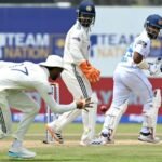 Rain halts India push after Dinusha century lifts Sri Lanka