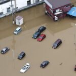 Four killed in Japan after record-breaking rainfall floods homes and roads