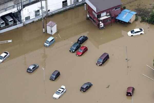 Four killed in Japan after record-breaking rainfall floods homes and roads