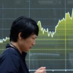Asian shares are mostly higher while US futures and oil prices hold steady