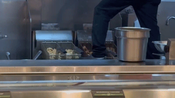 Video captures Panda Express worker standing near fryer during meal prep