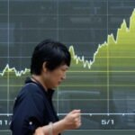Asian Shares Are Mostly Higher While US Futures and Oil Prices Hold Steady