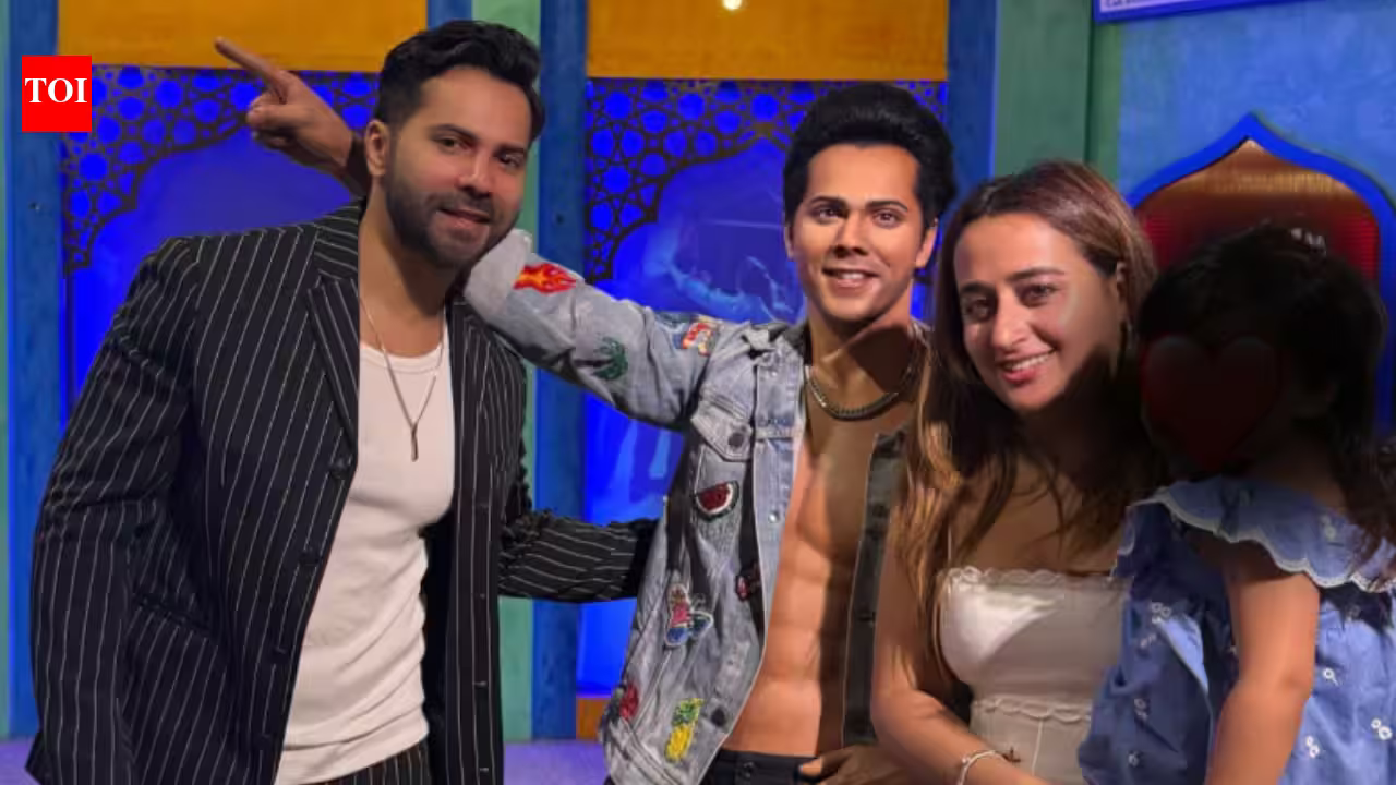 Varun Dhawan shares RARE family moments posing with his wax statue alongside Natasha Dalal and daughter Lara from Singapore vacation: 'Core memory unlocked' | Hindi Movie News