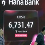 Asian Markets Stumble as Fed Rate Hike Echoes Through Global Trading