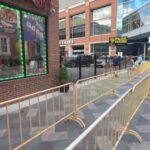 Barred from Business: Greektown Liquor Store Owner Sues Over City Fencing