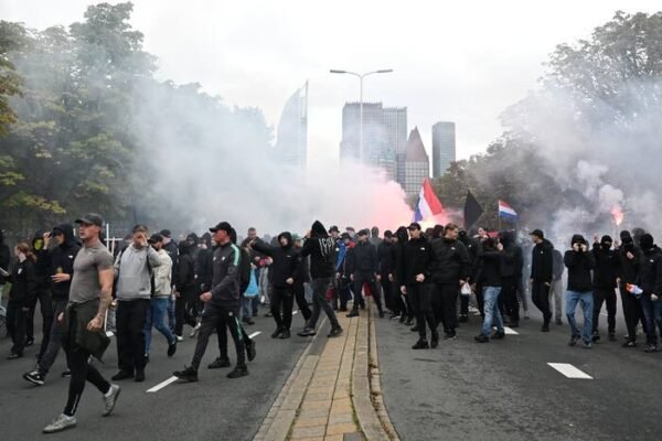 Batons and Barricades: Dutch Police Quell Far-Right Uprising in The Hague
