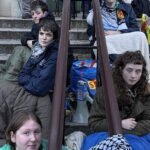 Chained to the Threshold: Students Occupy Government Office in Desperate Visa Standoff