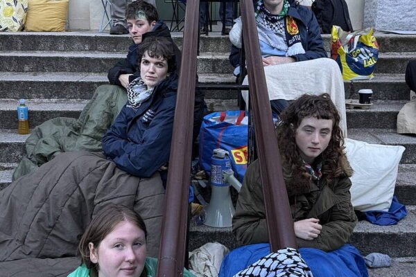 Chained to the Threshold: Students Occupy Government Office in Desperate Visa Standoff