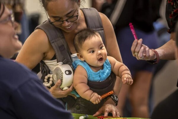 Drenched but Determined: South-Side Business Fair Defies Downpour with Record Turnout