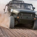GM, Ford Rivalry Expands Into Defense, Energy