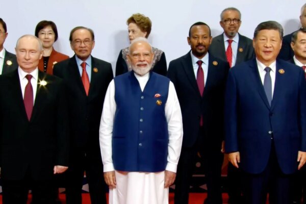 Global Titans Converge: Modi, Putin, and Xi Stand United at BRICS Summit