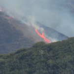 Grade Fire Halted: Crews Corral 33-Acre Blaze After Critical Stand
