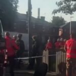 High-Stakes Standoff: Atherton Street Locked Down as Suspect Scales Rooftop