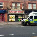 Midnight Volley: Bootle Man in Custody After Street Shooting Terror