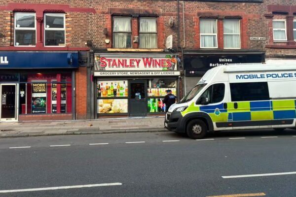Midnight Volley: Bootle Man in Custody After Street Shooting Terror