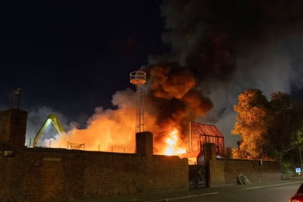 Plumes of Panic: Massive Scrap Yard Inferno Engulfs Liverpool Skyline
