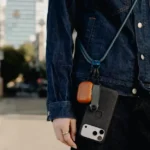 Tethered to the Trend: The High-Stakes Balancing Act of the Crossbody Phone Strap