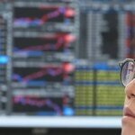Asian Markets Scale Higher as Wall Street Momentum Meets Cooling Oil Prices