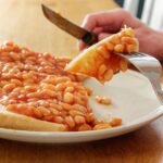 Baked Beans in the Crosshairs: How Burnham’s Tariff Gamble Risks the Great British Breakfast