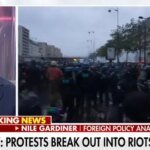 City of Light Obscured: Paris Erupts in Violence as Tear Gas Fills the Streets