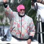 Defying Threats and Health Woes: Amitabh Bachchan Greets Devoted Fans Alongside Protective Son Abhishek