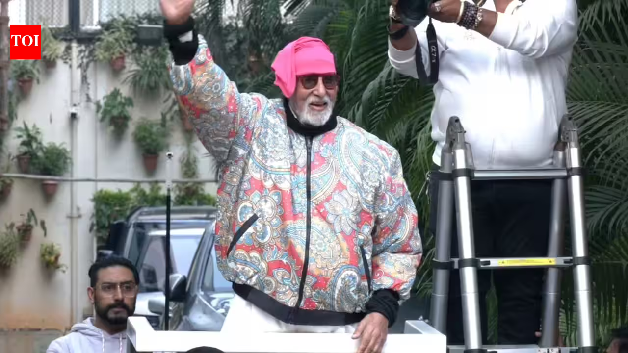 Defying Threats and Health Woes: Amitabh Bachchan Greets Devoted Fans Alongside Protective Son Abhishek