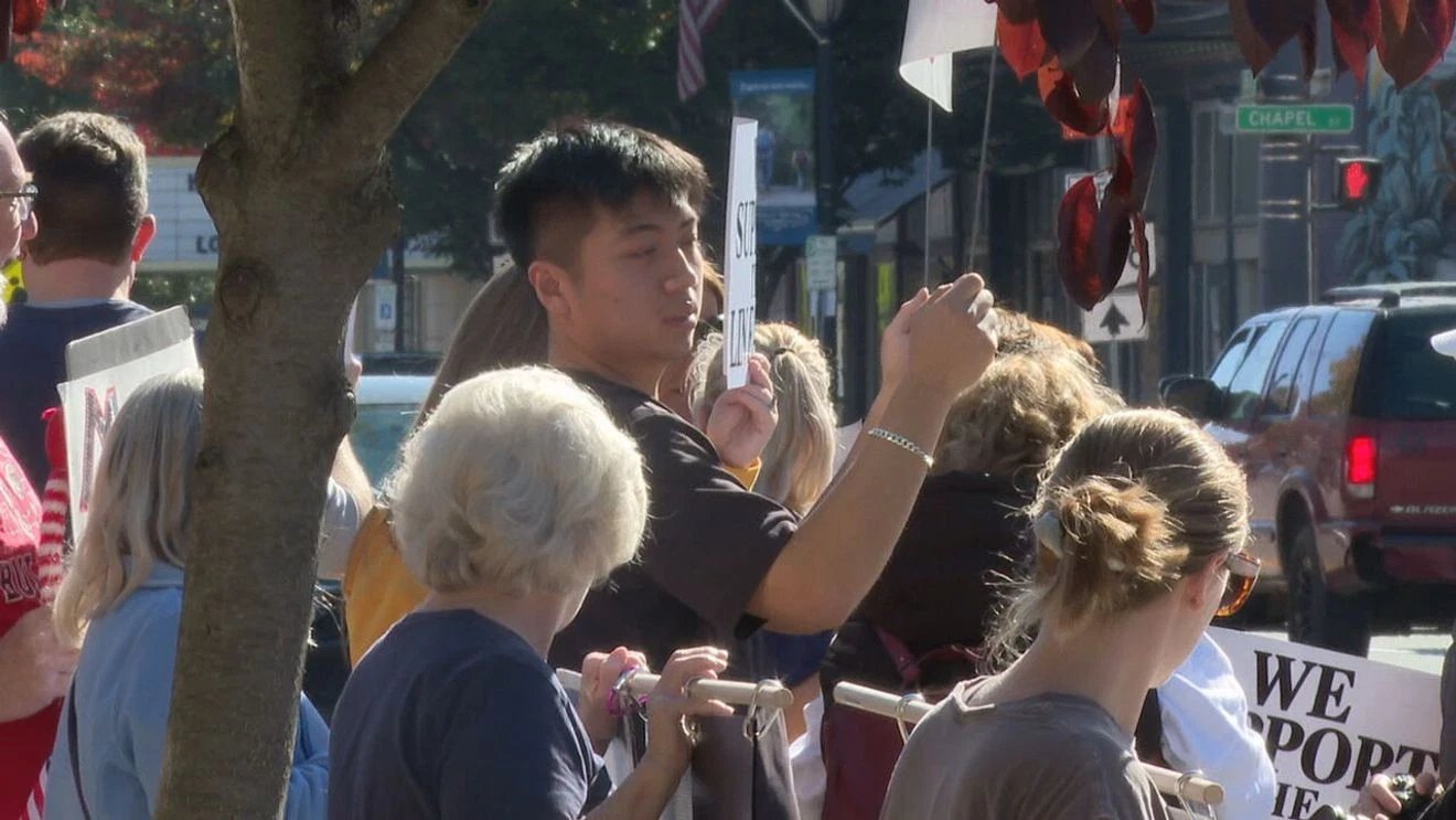 Mount Morris Rallies to Defend Beloved Local Merchant After ICE Custody Standoff