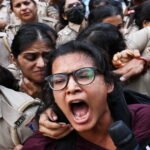 Saffron Seas: New Delhi Under Siege as Protesters Paint the Capital in Tricolour